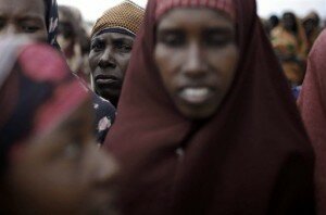 Somalian women wait for food aid in Merka