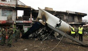 Security personnel secure scene where a cargo plane crashed into a commercial building at Utawala estate on outskirts of Kenya's capital Nairobi
